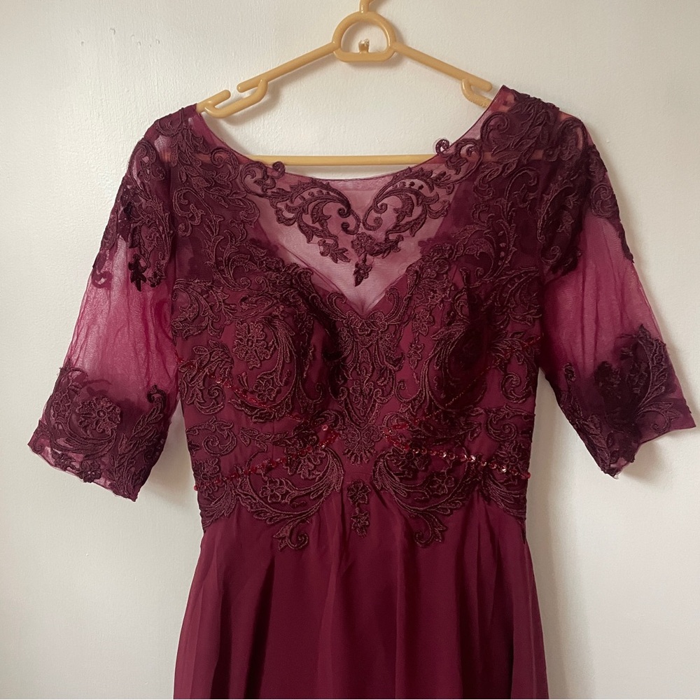 Beautiful burgundy mid sleeve lace gown